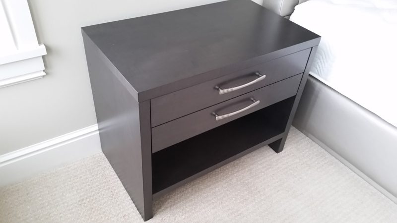Dark gray nightstand with two drawers and an open lower shelf